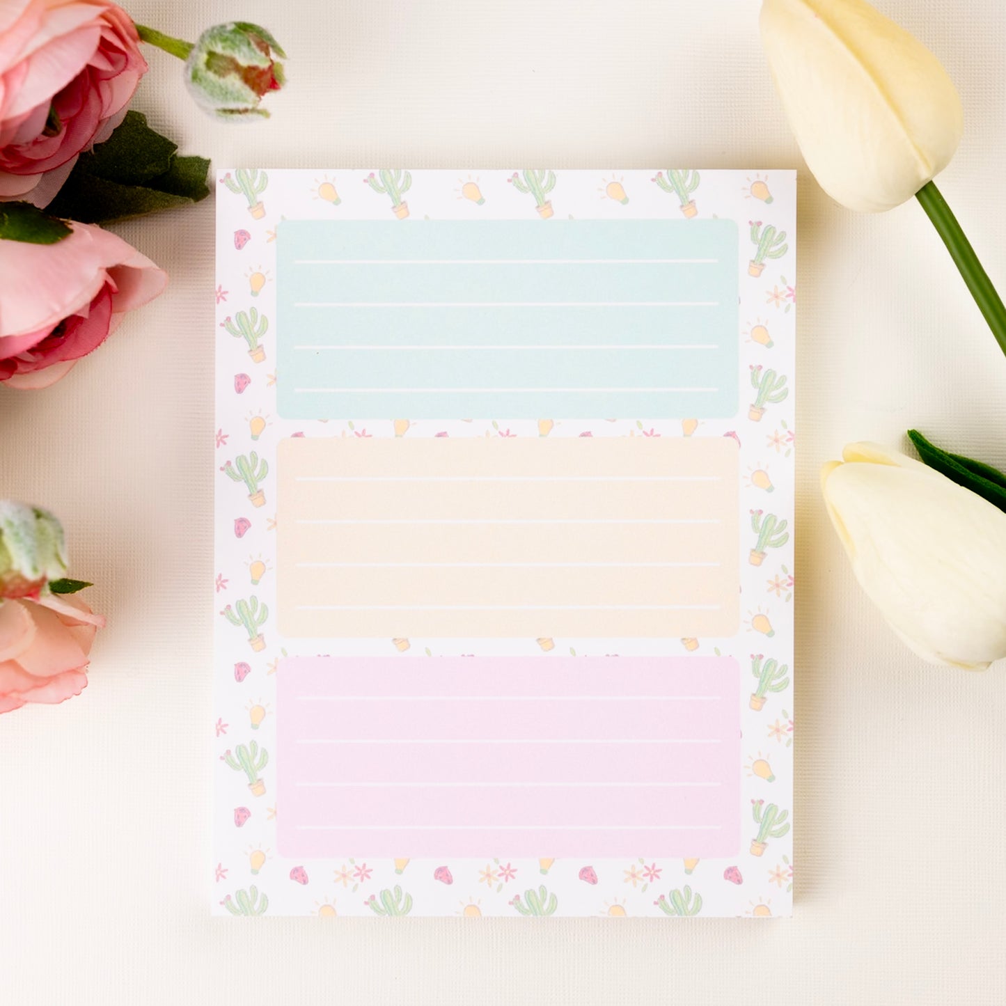 Pastel cactus-themed notepad with three lined sections in mint, yellow, and pink