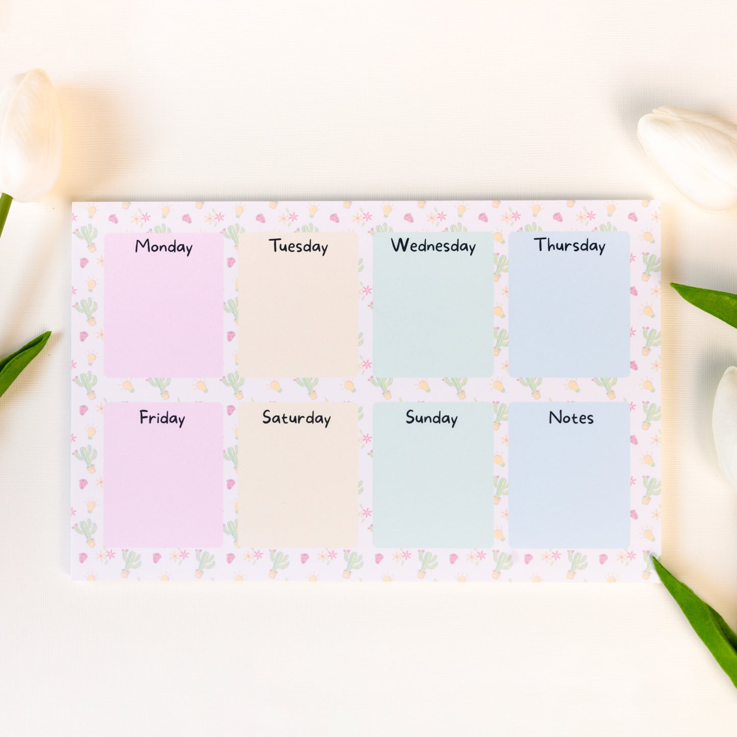 Pastel colored weekly planner notepad