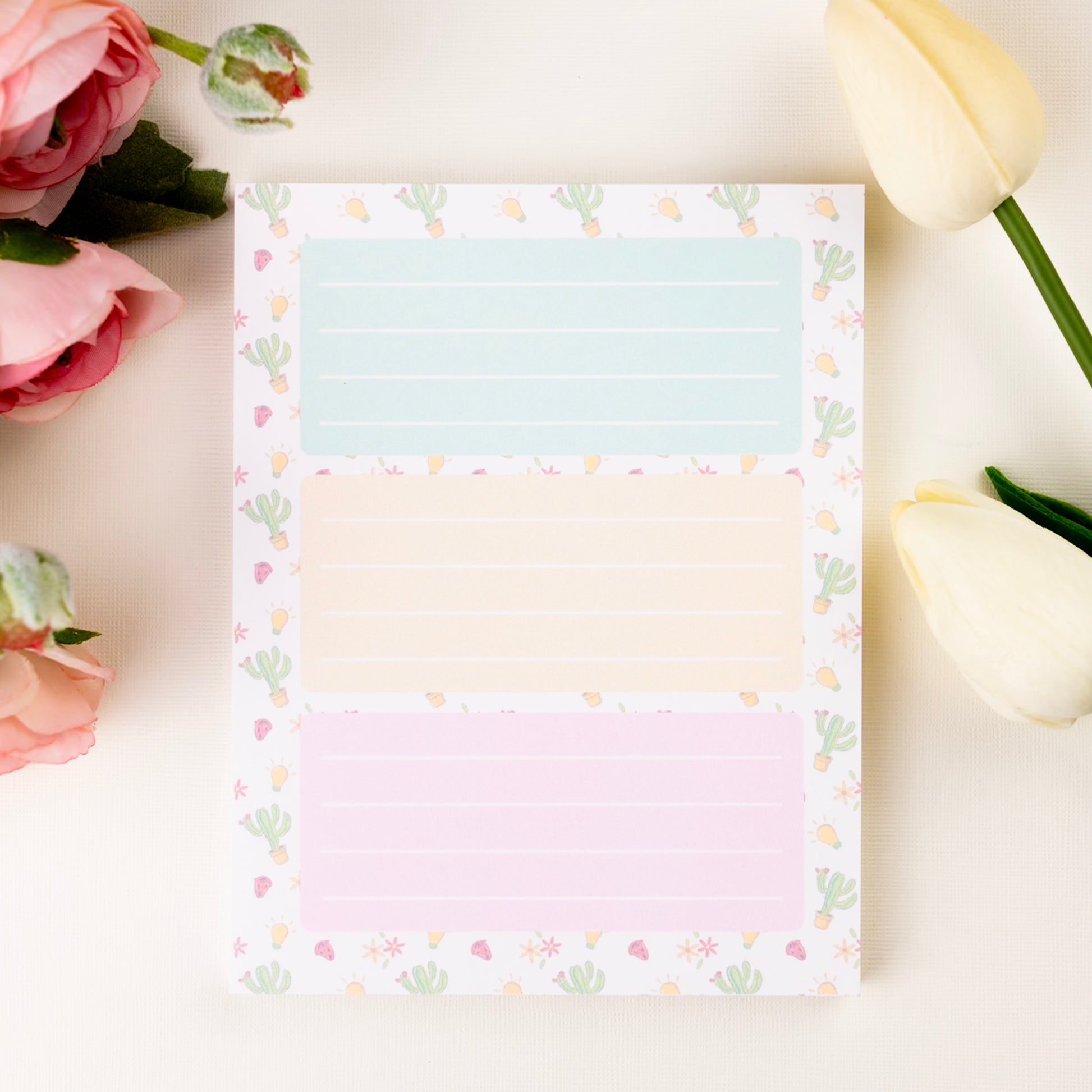 Pastel cactus-themed notepad with three lined sections in mint, yellow, and pink