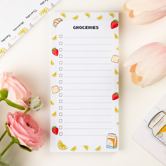 Strawberry-themed beige grocery list notepad