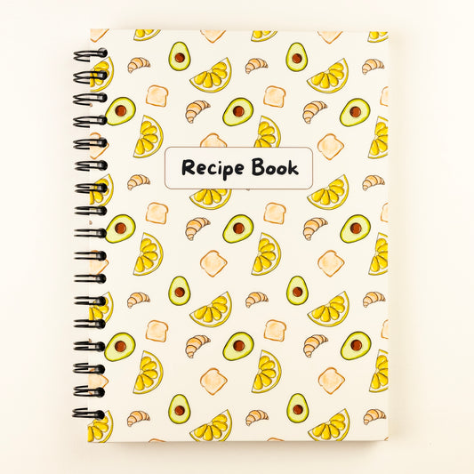 Lemon and avocado themed biege spiral-bound recipe book