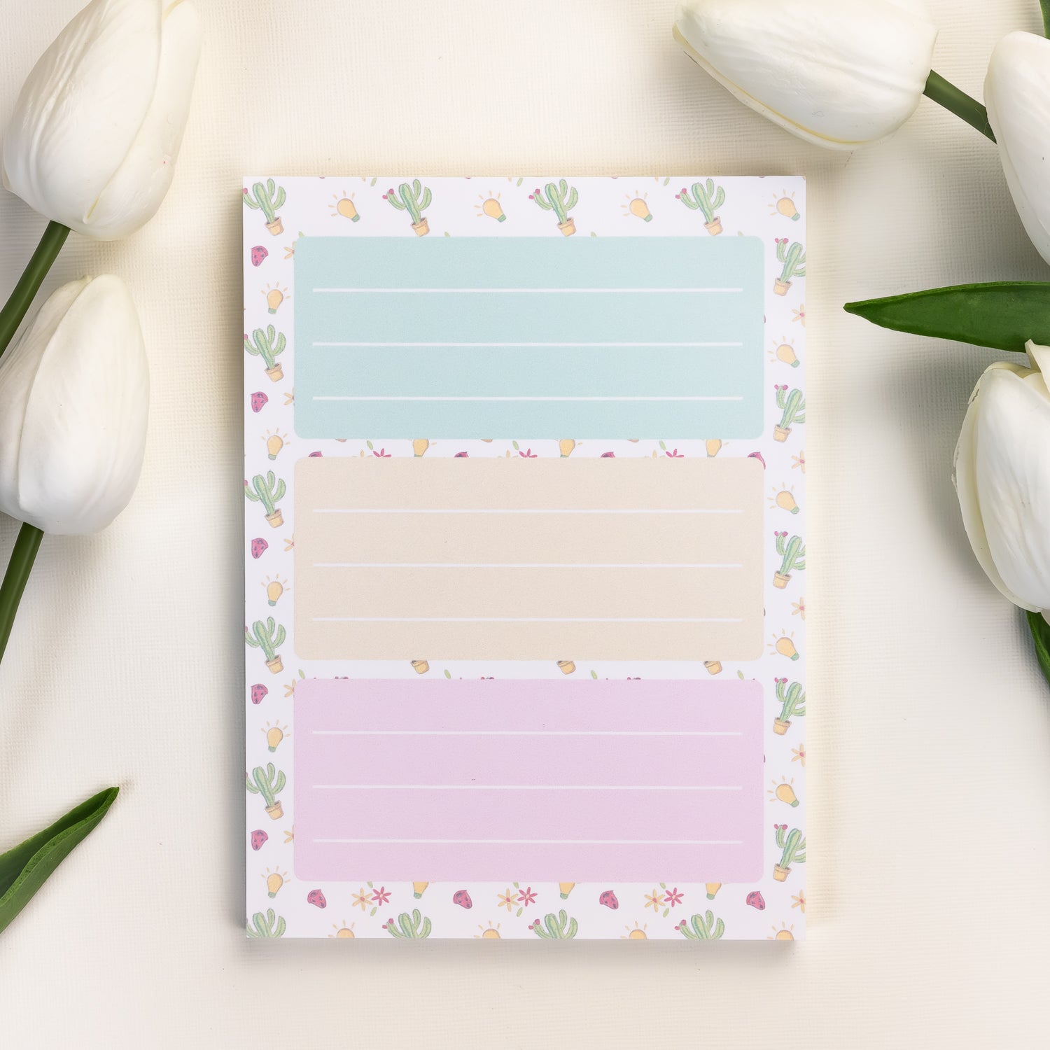 Pastel cactus-themed notepad with three lined sections in mint, yellow, and pink